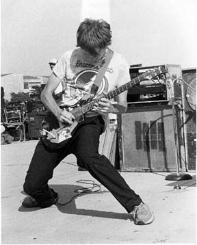 Black Flag's Greg Ginn wearing a Grateful Dead T-shirt